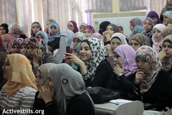 Palestinian women at a writing and art festival in Gaza, May 6, 2012, (Anne Paq/Activestills.org)
