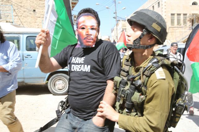 Hebron demonstrators were calling upon Obama to remember the civil rights movement in the US (Oren Ziv / Activestills)