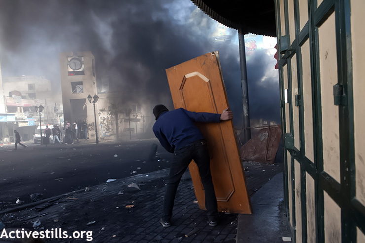 PHOTOS: Palestinian protesters clash with Israeli forces after death of long-term prisoner