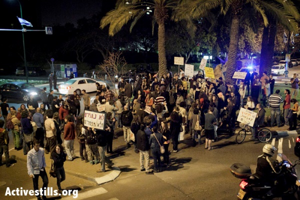 Activists hold first protest against Israeli Finance Minister Lapid