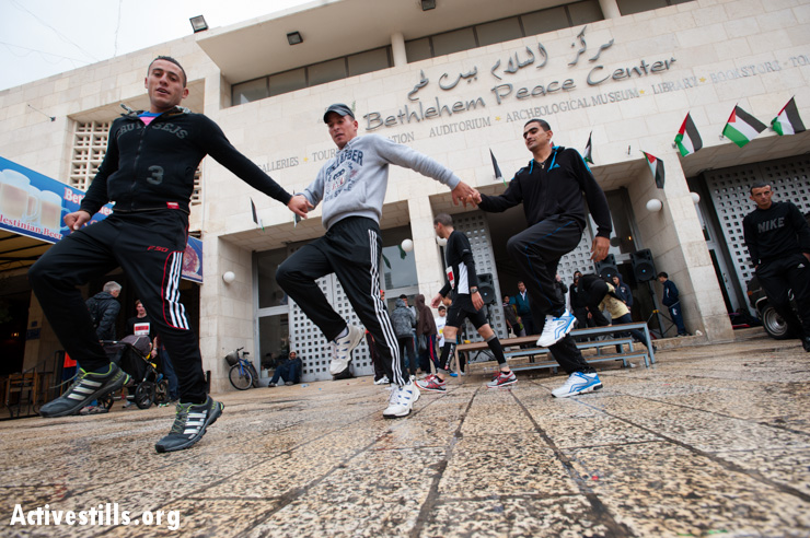 PHOTOS: First Palestine Marathon runs between walls in Bethlehem