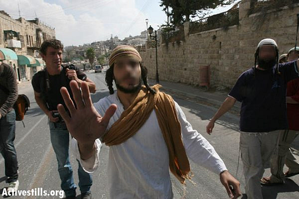 Jewish settlers in Hebron [illustrative photo] (Yotam Ronen/Activestills.org)