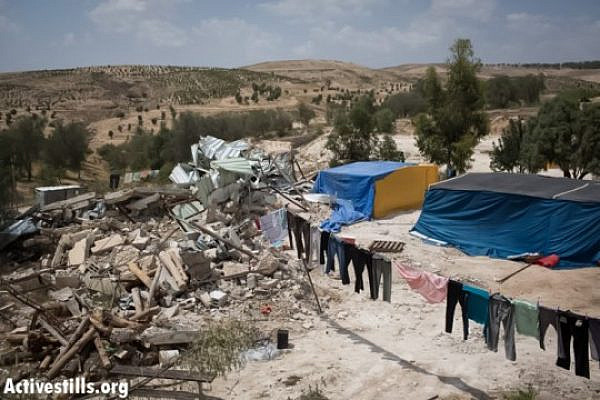 The "unrecognized" Bedouin village of Atir, May 21, 2013. On May 16, hundreds of Israeli policemen surrounded the village completely and demolished 15 structures. Residents of the village have built temporary tents to replace their demolished homes. (Photo by: Oren Ziv/Activestills.org)