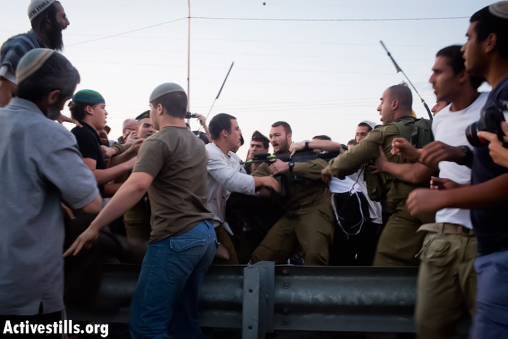 From settler reprisals to May Day marches: A week in photos April 25 - May 1