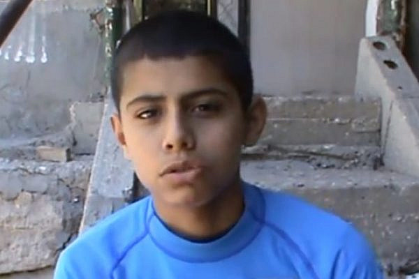 14 years old Muhammad Ayman Awawdeh is prevented from visiting his father, who is held in Israeli prison (photo: B'tzelem)