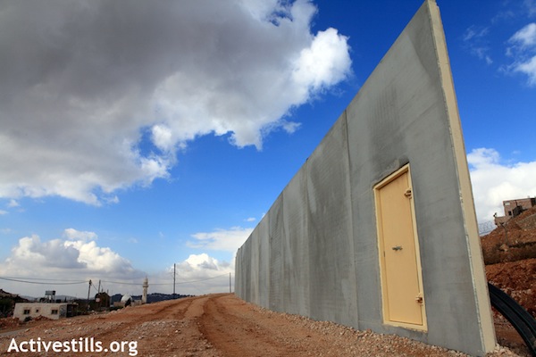 A partly constructed portion of Israel's separation wall, in Walaja, December 7, 2010 (Anne Paq/Activestills.org)