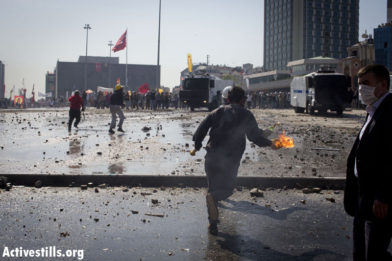 PHOTOS: Turkish police take over Taksim Square, push back protesters