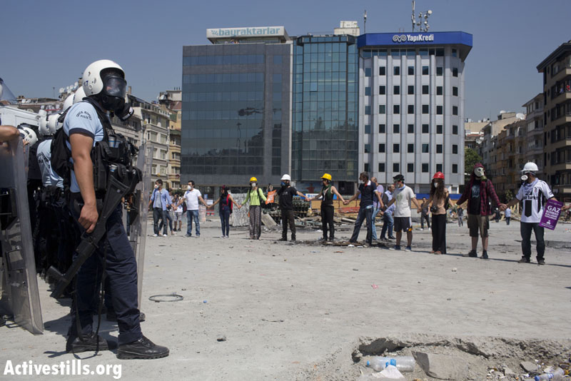 PHOTOS: Turkish police take over Taksim Square, push back protesters