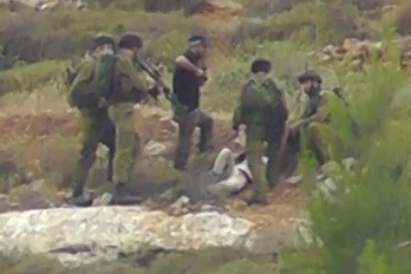 Soldiers refuse treatment to injured Palestinian boy near settlement of Eli (Screenshot/Yesh Din)