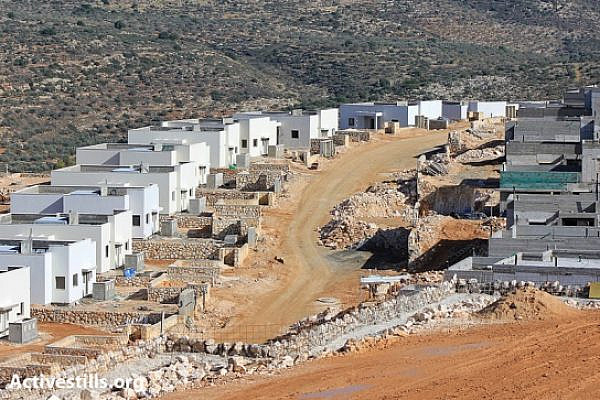 Building of the new settlement of Leshim on the lands of the West Bank village of Kafr ad Dik, near Salfit, December 7, 2012. (photo: Activestills)