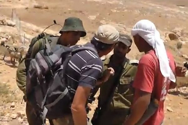 IDF arresting Palestinian shepherd (Ta'ayush)