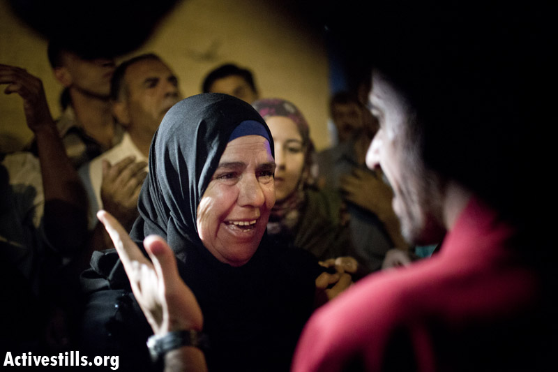 PHOTOS: Released Palestinian prisoners arrive home to West Bank