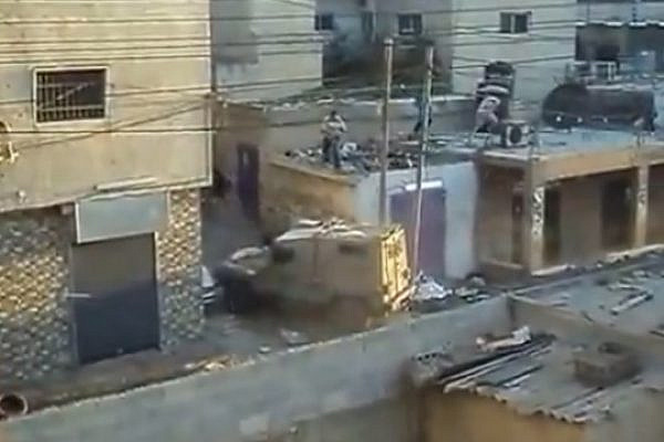 Army vehicle attacked with stones in Qalandia, 26.8.2013 (youtube)