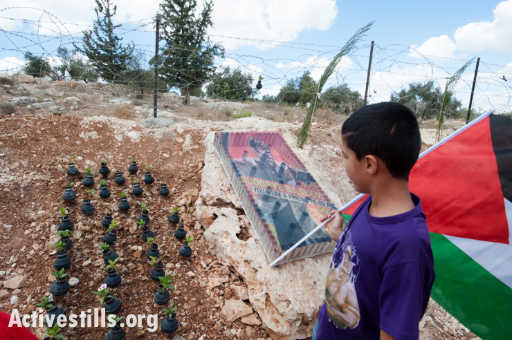 PHOTOS: What the press missed in Bil'in tear gas flower garden