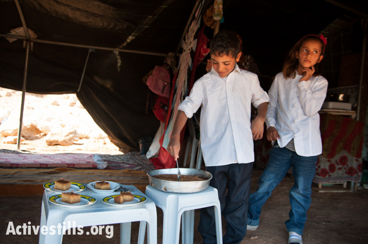 PHOTOS: Forced to live in a tent, Palestinian family celebrates Eid al-Adha