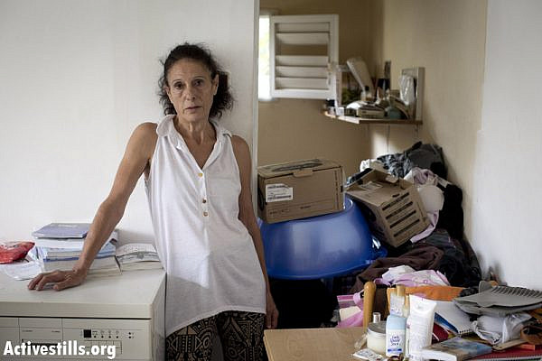 Sima Kavlo, living in the apartment for 34 years, after her parent passed away. (Oren Ziv/Activestills.org)