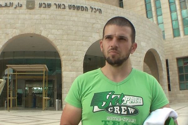 Ido Naveh exits the Be'er Sheva court after being released on October 4, 2013. (Photo: David Sheen)