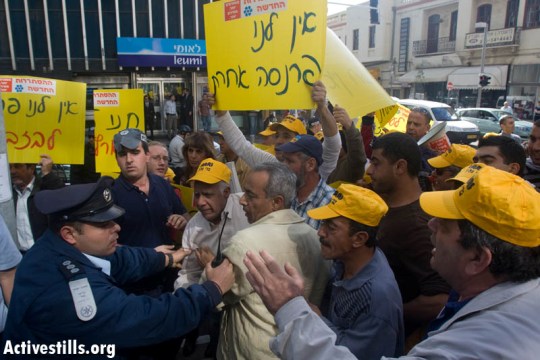 Pri Galil workers clash with police as their factory is lkely to close down, 2009 (Oren Ziv / Activestills)