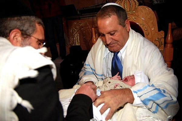 A Jewish child is circumcised in a traditional Brit Mila ceremony (Illustrative photo by Shutterstock.com)
