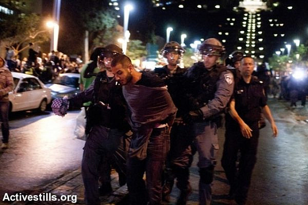 Haifa anti-Prawer demonstrator arrested on Day of Rage (Activestills)