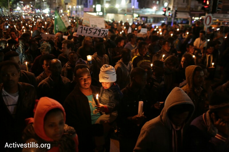 PHOTOS: Thousands of asylum seekers hold 'silent march' on streets of Tel Aviv