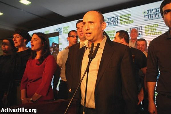 Naftali Bennett and Ayelet Shaked of Jewish Home at the party headquarters on election day 2013 (Activestills)