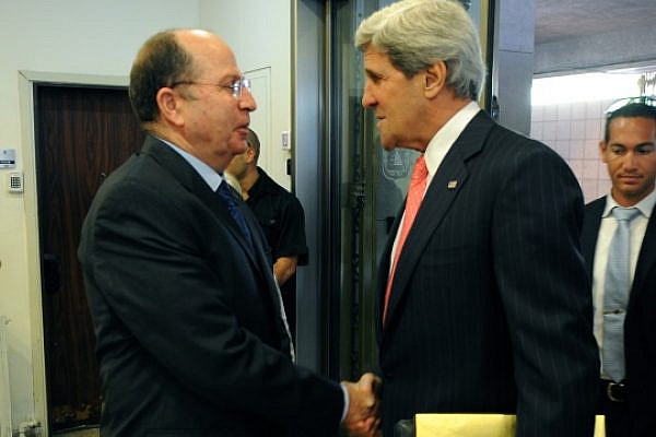 U.S. Secretary of State John Kerry is welcomed by Israeli Defense Minister Moshe Ya'alon in Jerusalem on May 23, 2013. (State Dept Photo)