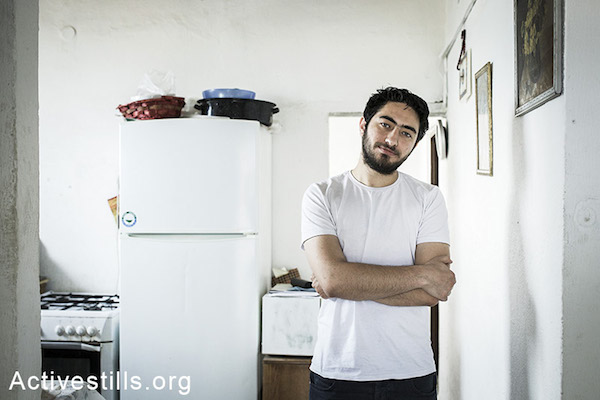 Majd Kayyal at his home in Haifa days after he was released from Shin Bet custody. (Photo by Shiraz Grinbaum/Activestills.org)