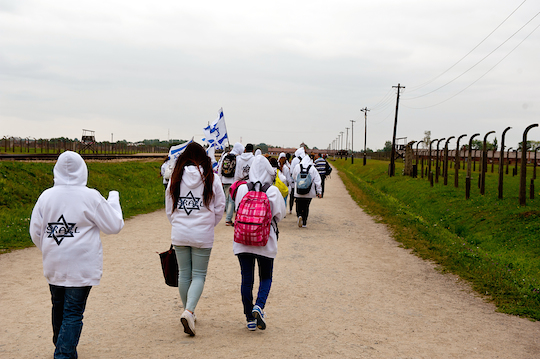 Israeli high school students visit the Birkenau concentration camp in Poland. (Photo by Borzywoj / Shutterstock.com)