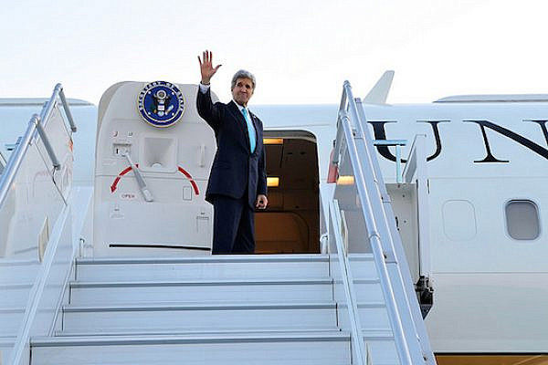 Secretary of State John Kerry waves goodbye. (File photo by State Dept.)