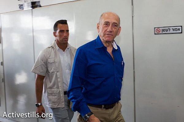Ehud Olmert in the Tel Aviv District Court on the day of his sentencing. (photo: Activestills.org)