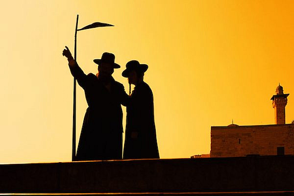 Illustrative photo of ultra-Orthodox Jews and a mosque's minaret. (Photo: Shutterstock.com)