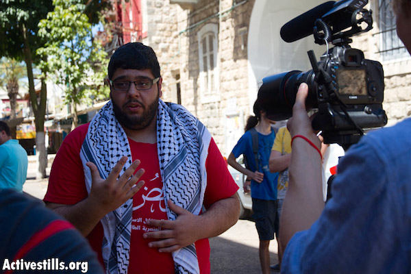 Druze conscientious objector Urawa Jaleb Saif, June 15, 2014, Haifa. (Photo by Oren Ziv/Activestills.org)