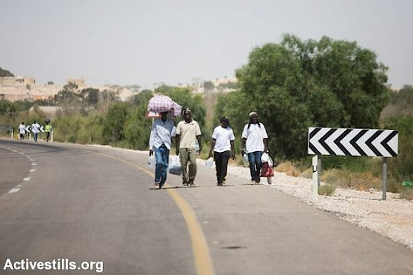 African asylum seekers walking towards the March For Freedom camp, Negev Desert, June 28, 2014. (Photo by Yotam Ronen/Activestills.org)