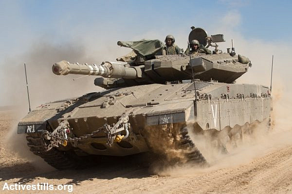 An Israeli tank on the border with Gaza. (photo: Activestills.org)