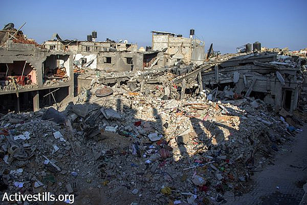 A view from Abu Odeh’s house toward the neighbourhood. August 12, 2014. (Basel Yazouri/Activestills.org)