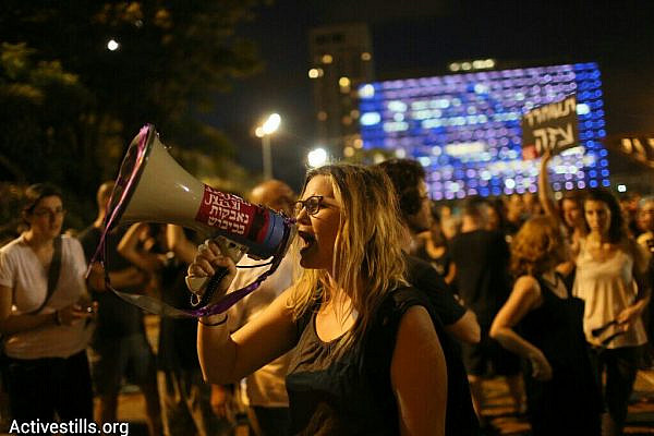 Hundreds gather in Tel Aviv to protest Israel's Operation Protective Edge, despite a police decision to revoke the demonstration's permit, Rabin Square, Tel Aviv, July 9, 2014 (photo: Activestills)