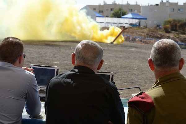 Israeli Prime Minister Benjamin Netanyahu, with IDF Chief of Staff, Benny Gantz and then Home Front Defense Minister Gilad Erdan watching a military drill. (Photo: Amos Ben Gershom/GPO)