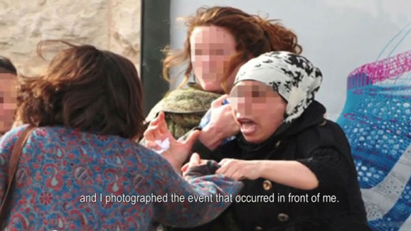 The incident in Jerusalem, as photographed by Dorit Jordan-Dotan. (Screenshot from the fundraising campaign.)