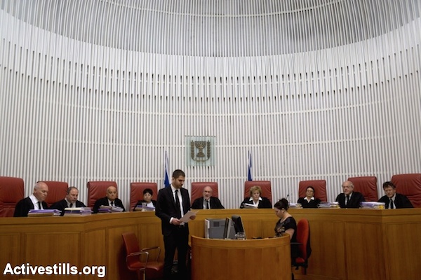 Israel's Supreme Court sits as the High Court of Justice, April 1, 2014. (Photo by Oren Ziv/Activestills)