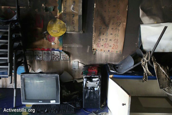 A burned first-grade classroom at Jerusalem’s bilingual school after it was the target of an arson attack, November 30, 2014. (Photo by Activestills.org)