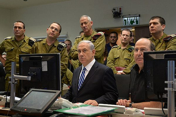 File photo of Prime Minister Netanyahu holding a security briefing with IDF generals, July 18, 2014. (Photo by Haim Zach/GPO)