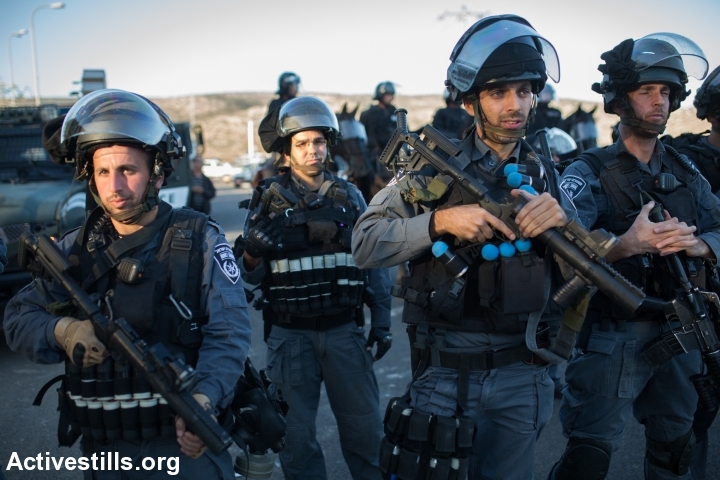Israeli riot police pictured during clashes in Kafr Kanna, in the wake of the shooting death of Khir Hamdan. (photo: Yotam Ronen/Activestills.org)