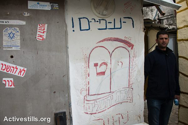 Daoud Al-Ghoul, shown near properties taken over by Israel settlers in Jerusalem's Old City. (photo: Activestills.org)