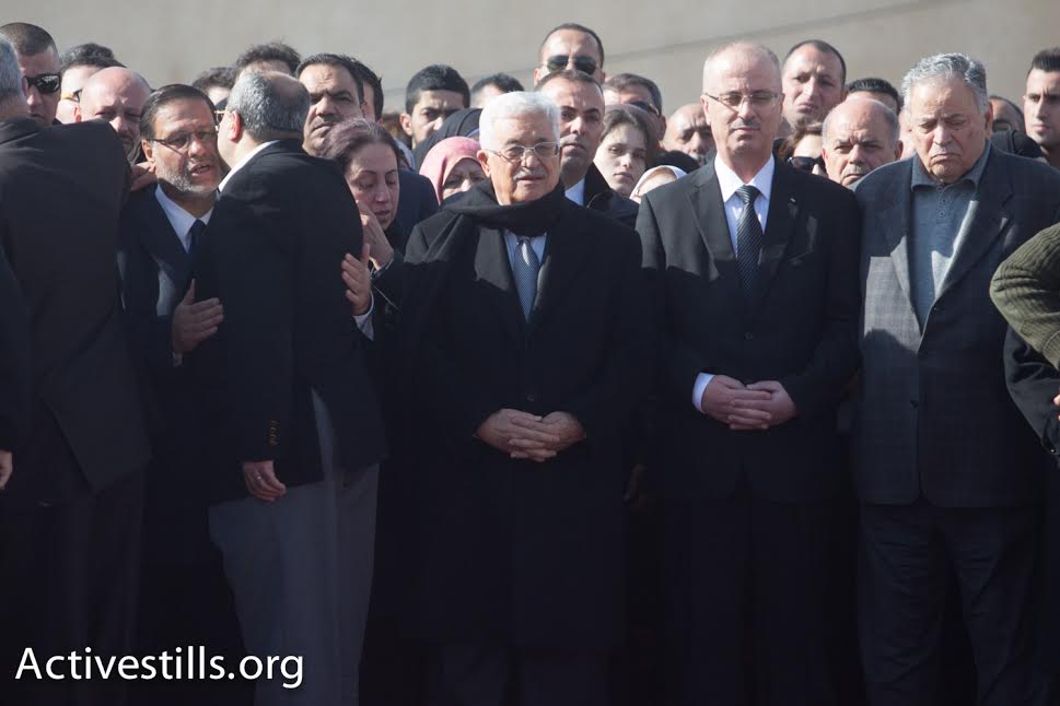PA President Mahmoud Abbas looks on during the funeral of PA minister Ziad Abu Ein, Ramallah, December 11, 2014. (photo: Yotam Ronen/Activestills.org)