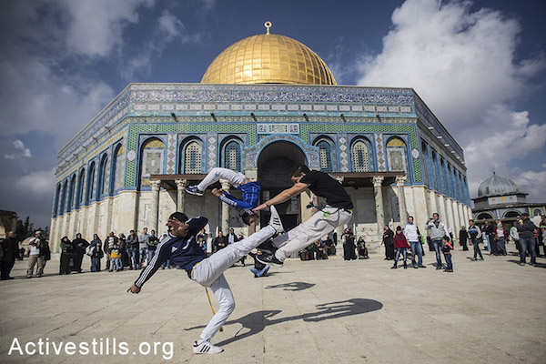 Palestinian youth preform a Capoeira session in front of Al Aqsa mosque, November 22, 2014. Faiz Abu-Rmeleh/Activestills.org