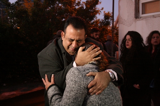Residents of Givat Amal after being evicted from their homes, Tel Aviv, December 29, 2014. (Photo by Haggai Matar)
