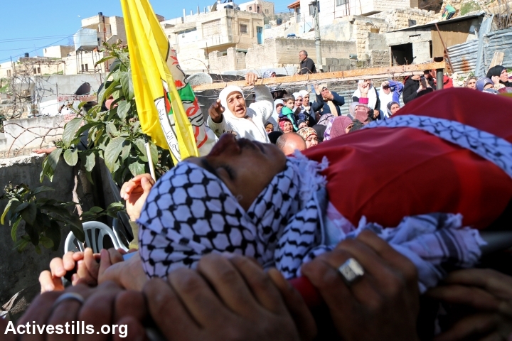 The body of Ahmed Najjar (19 years-old), who was shot to death by the Israeli army on Saturday nearby his village Burin,  is carried by mourners during his funeral, Nablus, West Bank, February 1st, 2015. (photo: Ahmad al-Bazz/Activestills.org)