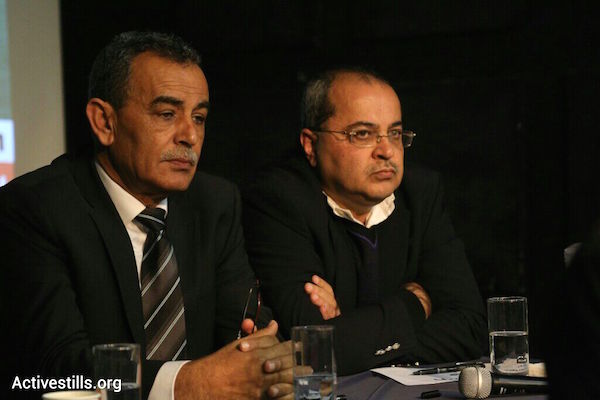 Balad head MK Jamal Zahalka (left) and Ta'al head MK Ahmad Tibi, February 11, 2014. (Photo by Activestills.org)