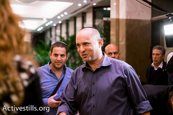 Jewish Home chairman Naftali Bennett campaigning. (Yotam Ronen/Activestills.org)